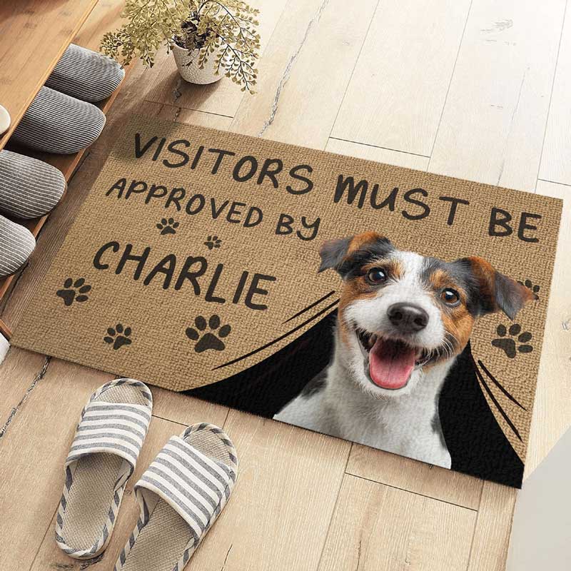 Custom doormat with smiling dog, text "Visitors must be approved by Charlie", paw prints; housewarming gift